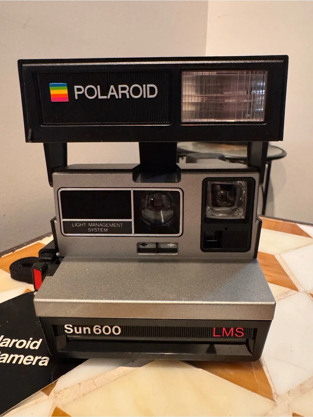 Polaroid Sun 600 LMS Instant Camera - Black and Silver